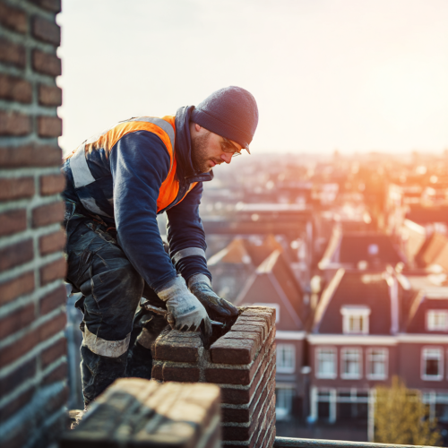 u3218957996_A_modern_chimney_sweeper_working_on_a_rooftop_wea_33097331-99ba-49dd-b93c-d7ec7f35379c_0